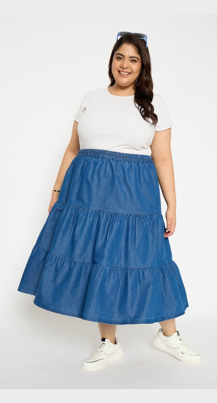 Blue denim tiered midi skirt with elasticated waist, worn with a white tee
