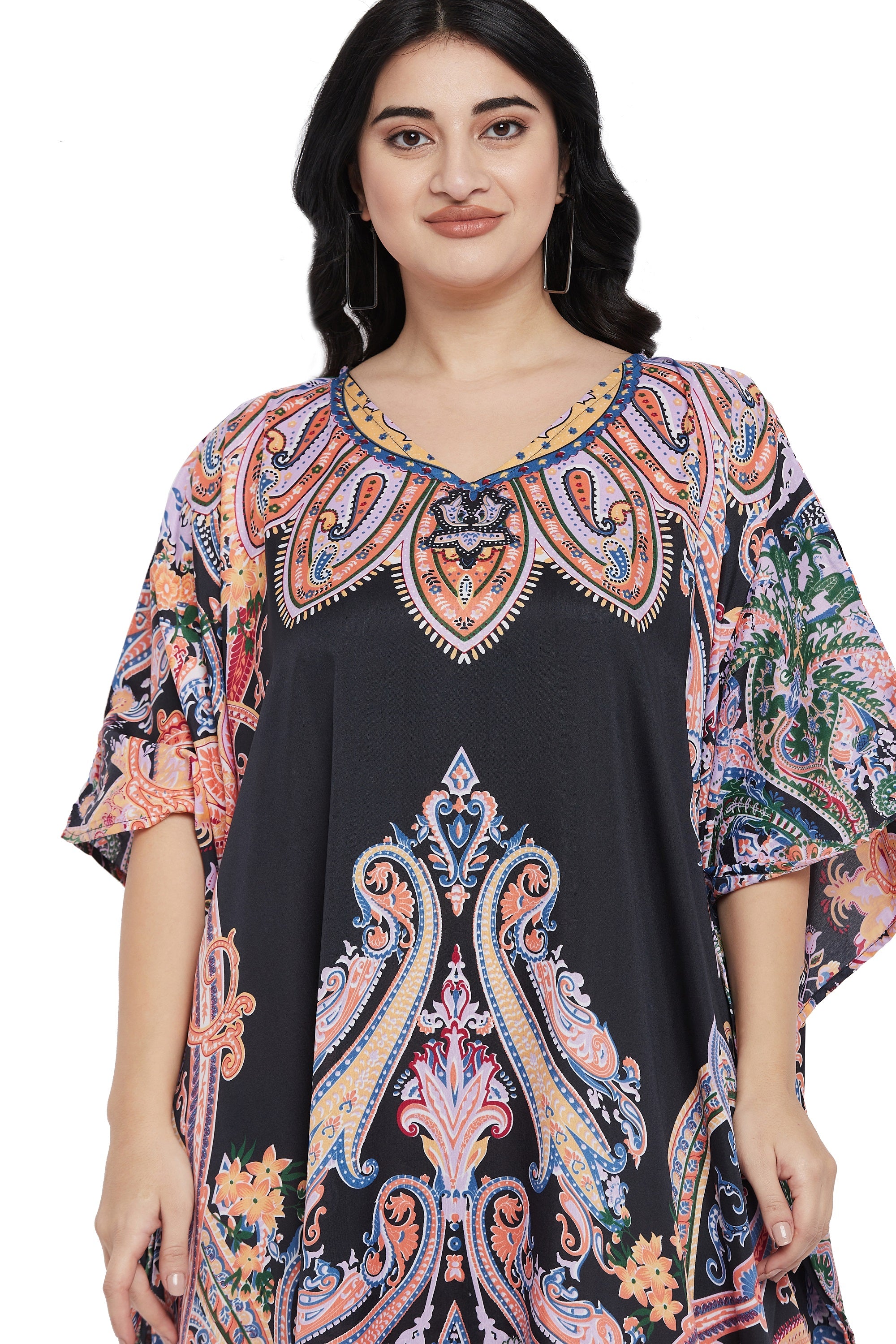 Black plus size kaftan with ornate coral and pink paisley print and wide kimono sleeves — another angle