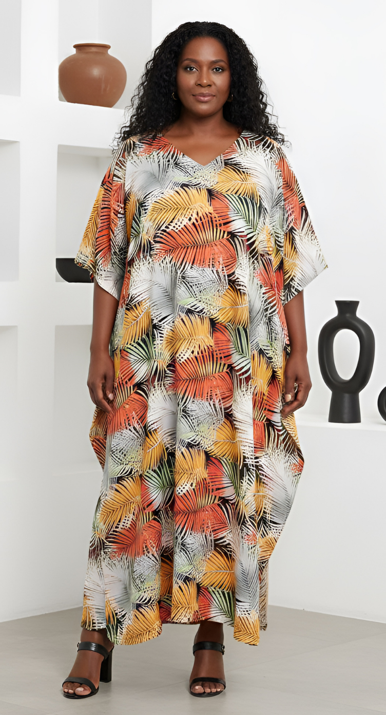White plus size kaftan with orange and yellow palm frond print and kimono sleeves