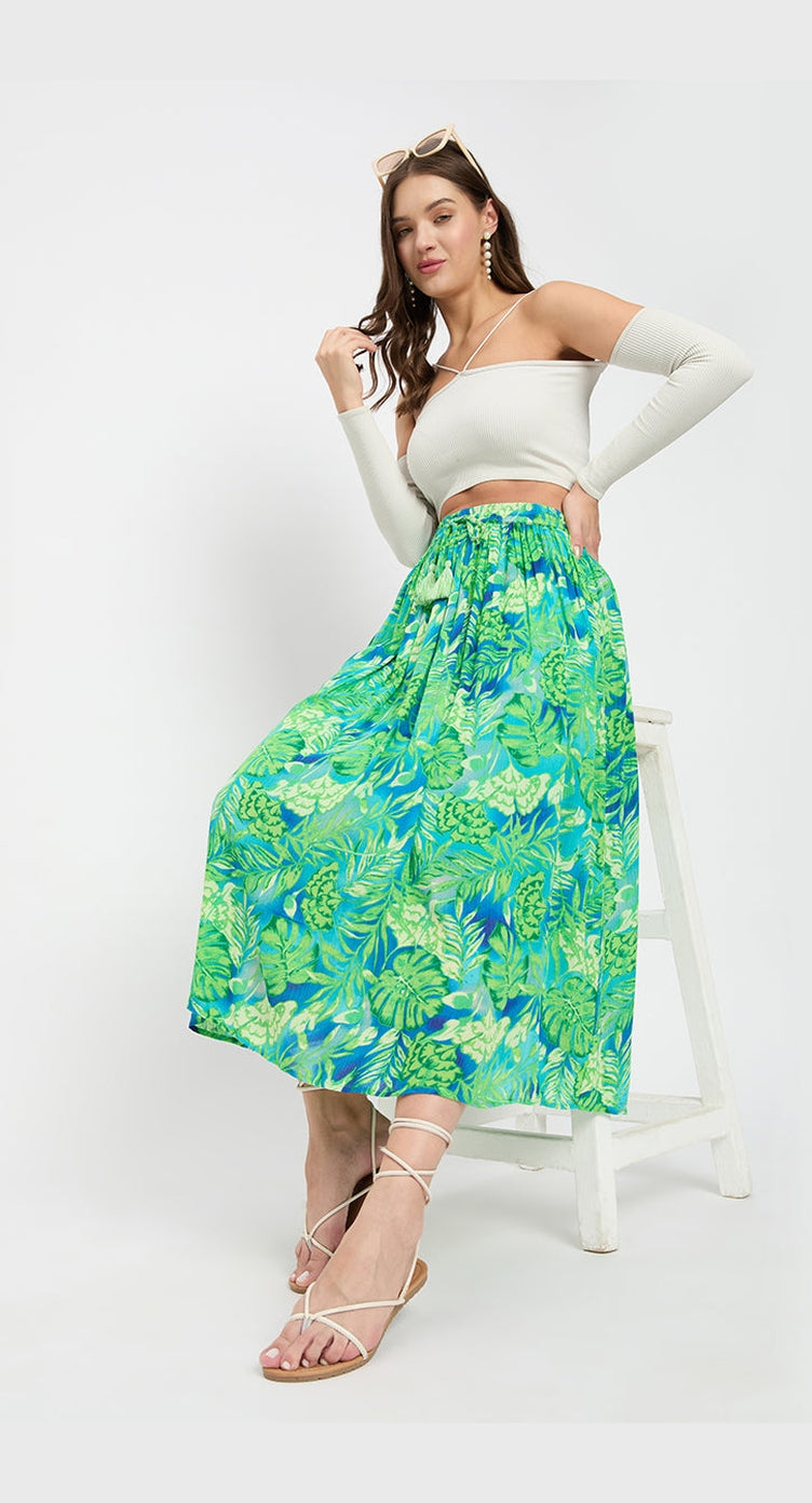 Green tropical floral print rayon gathered maxi skirt, worn with a white crop top