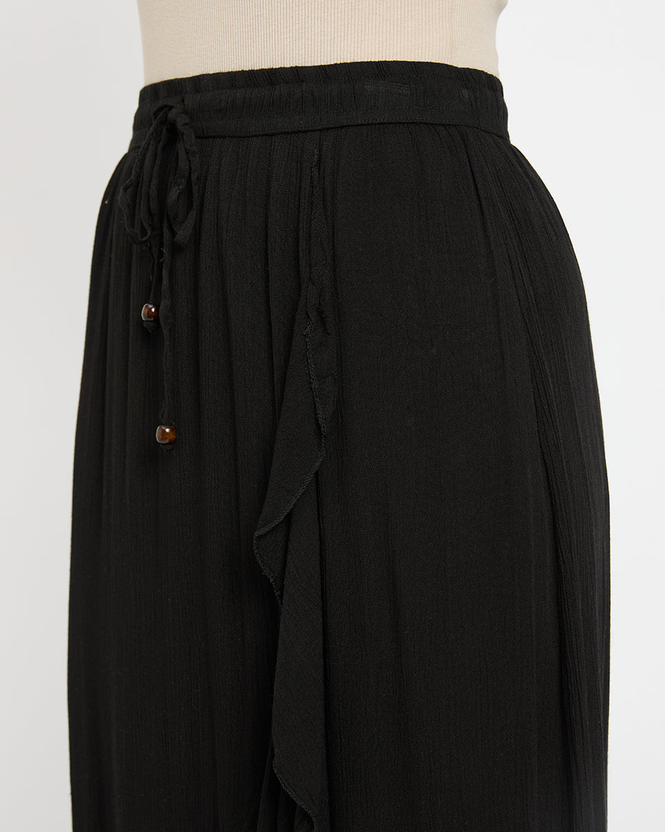 Solid Black Rayon And Ploy Knit Asymmetrical Long Skirt For Women